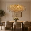 Gold branch crystal chandelier, 120×60cm oval, over a rectangular dining table