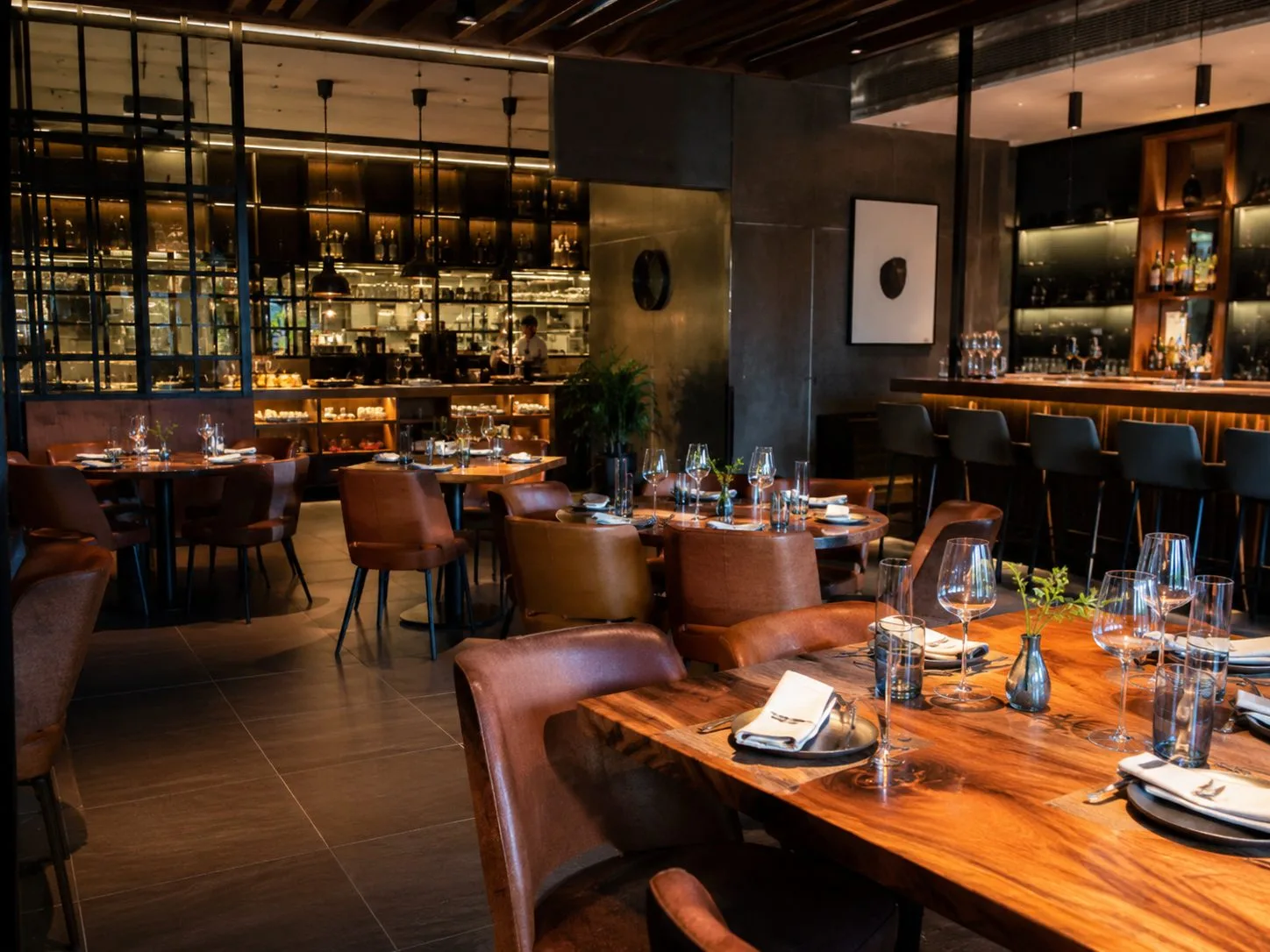 Warm designer lighting scene in an upscale restaurant dining room