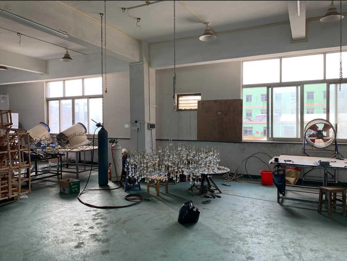 Crystal-setting workshop where crystal is hand-hung onto finished chandelier frames