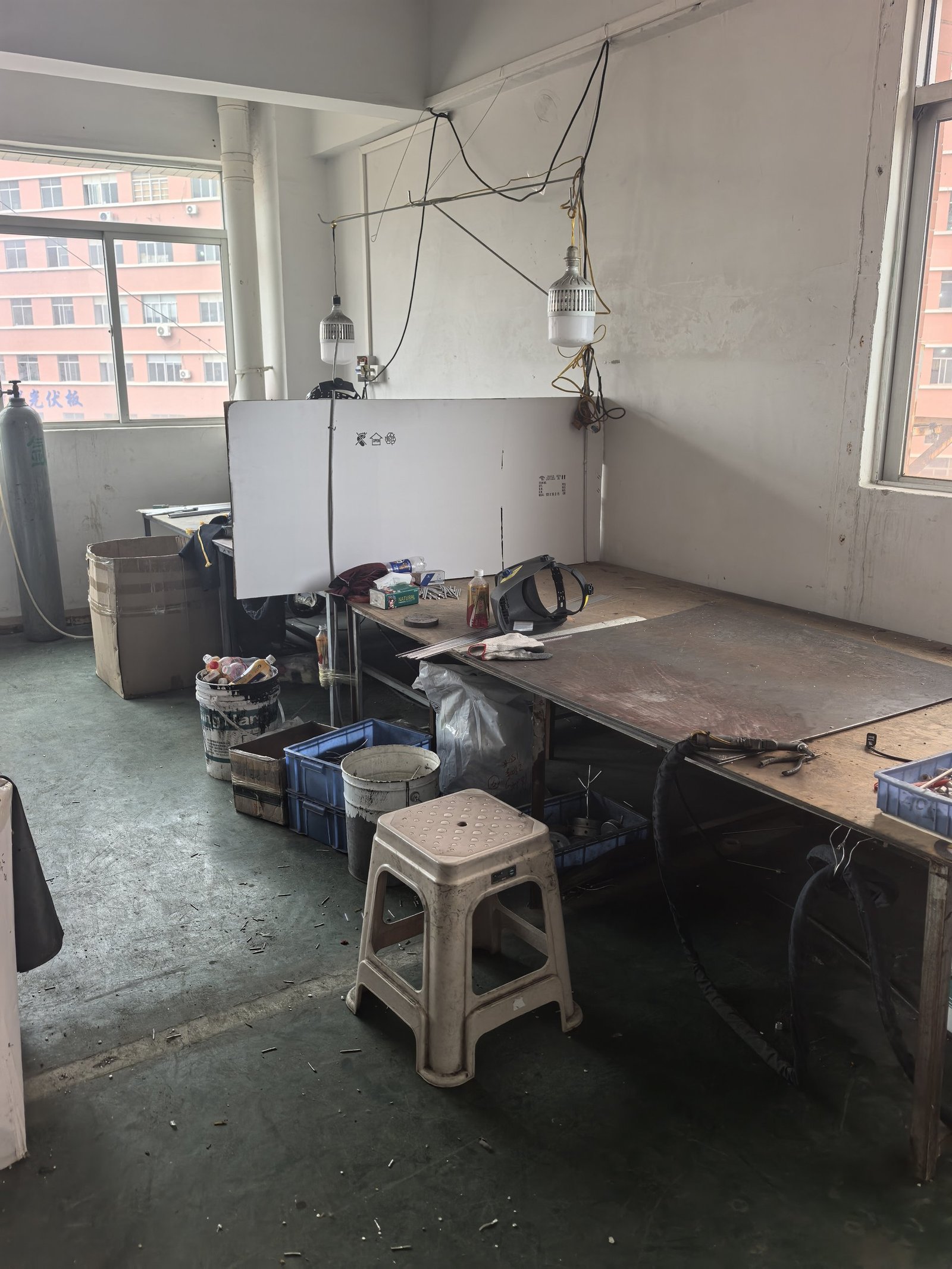 Welding workbench in the HongFu Lighting frame shop