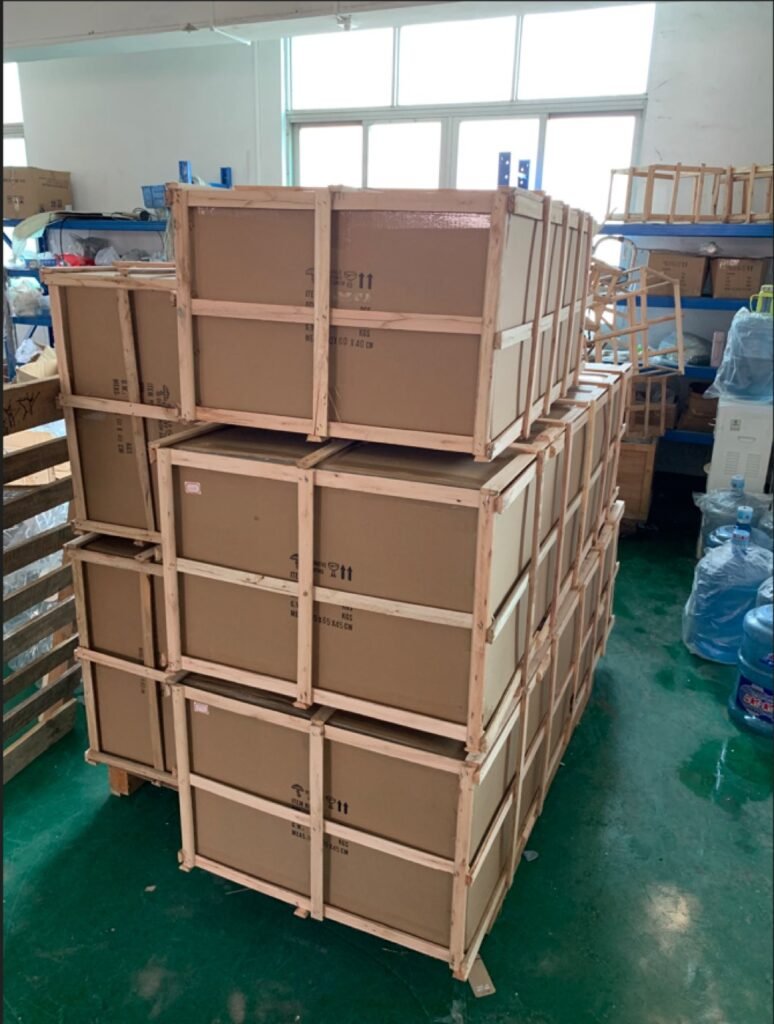 Crystal chandeliers packed in wooden crates ready for shipping